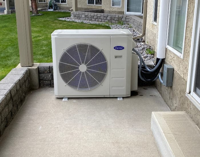 The person working on the ductless split in Edmonton, AB