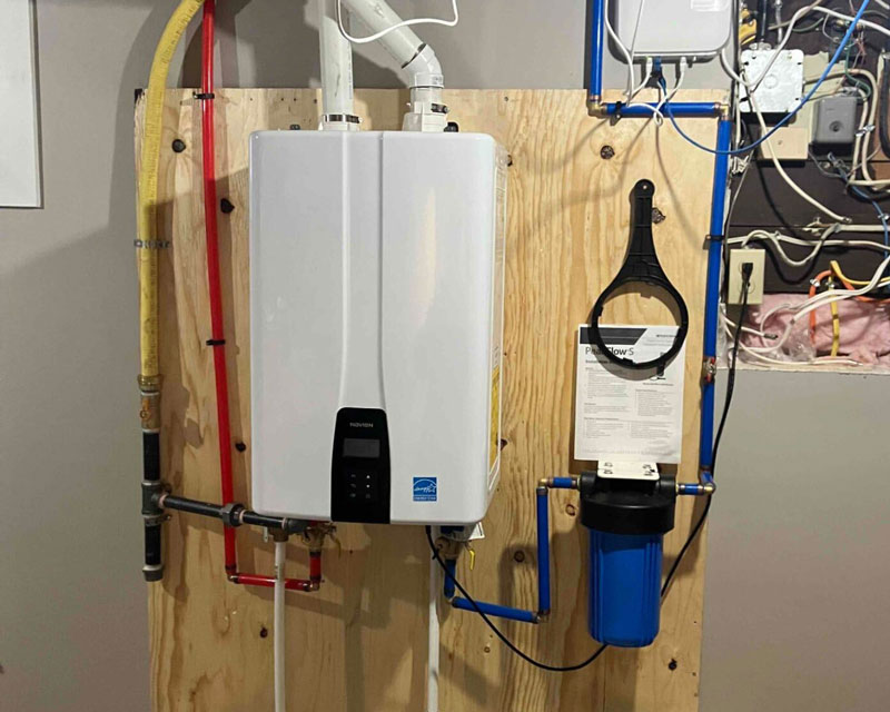 Hydro-Flo Plumbing & Heating installed a white tankless water heater in Edmonton, AB.