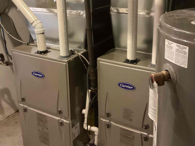 A furnace installed in a house by Hydro-Flo Plumbing & Heating in Edmonton, AB