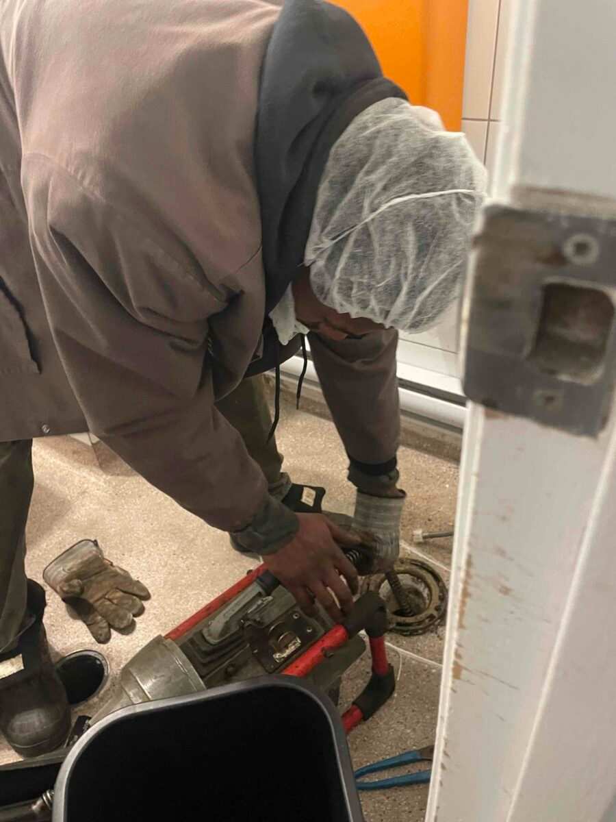 A Close-up View of the Technician Performing Drain Cleaning Service in Edmonton, AB